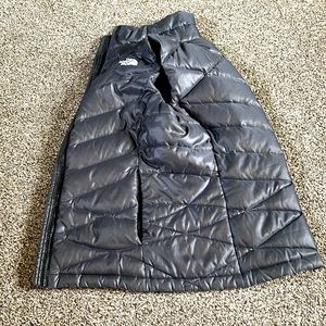 the north face charcoal color vest.